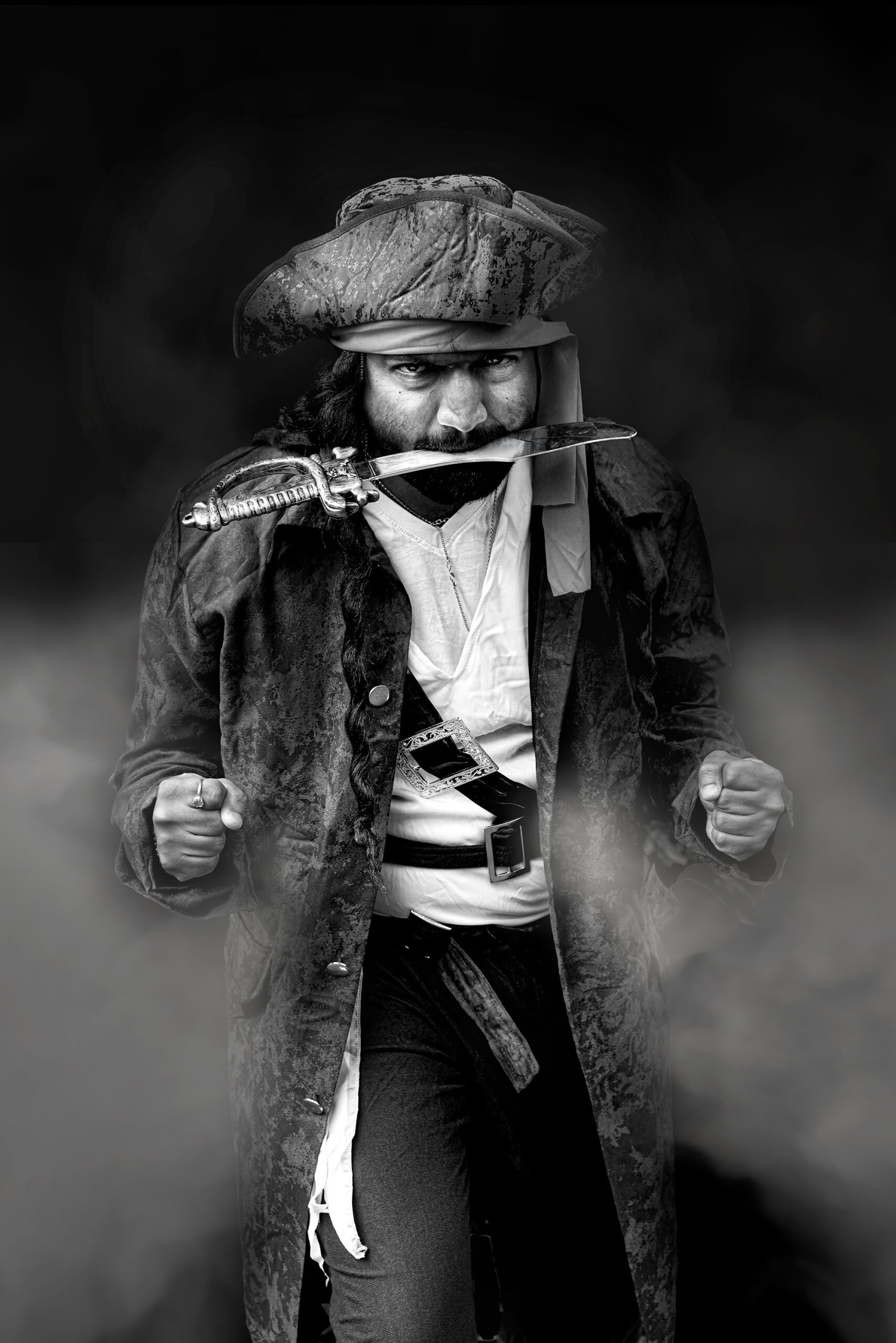 Intense black-and-white pirate portrait with sword, dramatic expression, and detailed textures.